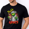 Funny Daddy Grinch Christmas T-shirt featuring a cool green festive character. A cheeky Christmas gift for Dad, perfect for parties and festive outfits.