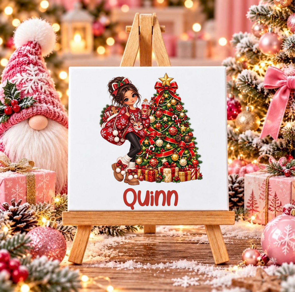 Personalised Christmas girl ceramic tile with name, featuring a festive girl beside a decorated Christmas tree, displayed on a wooden stand.